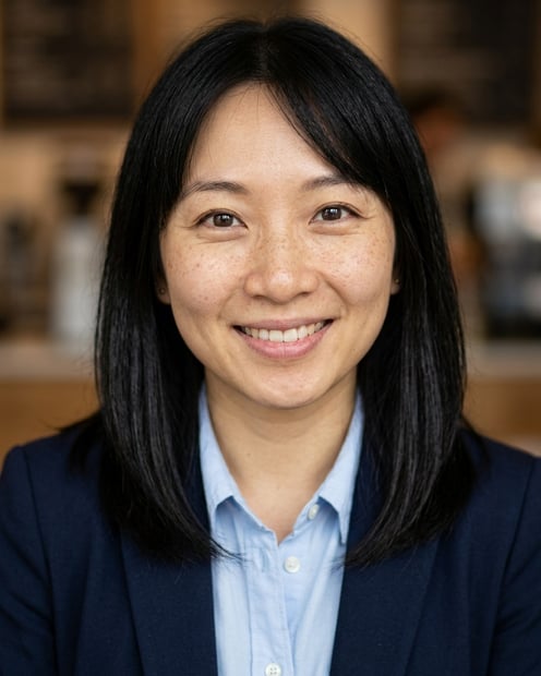 Cafe · Navy blazer with light blue shirt headshot example