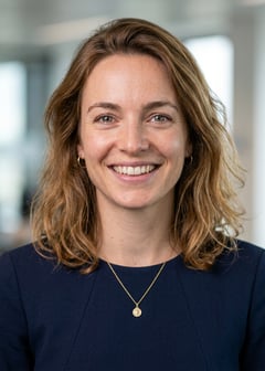 Professional AI LinkedIn headshot in Navy blue sleeveless dress on Office / Modern Office Workspace