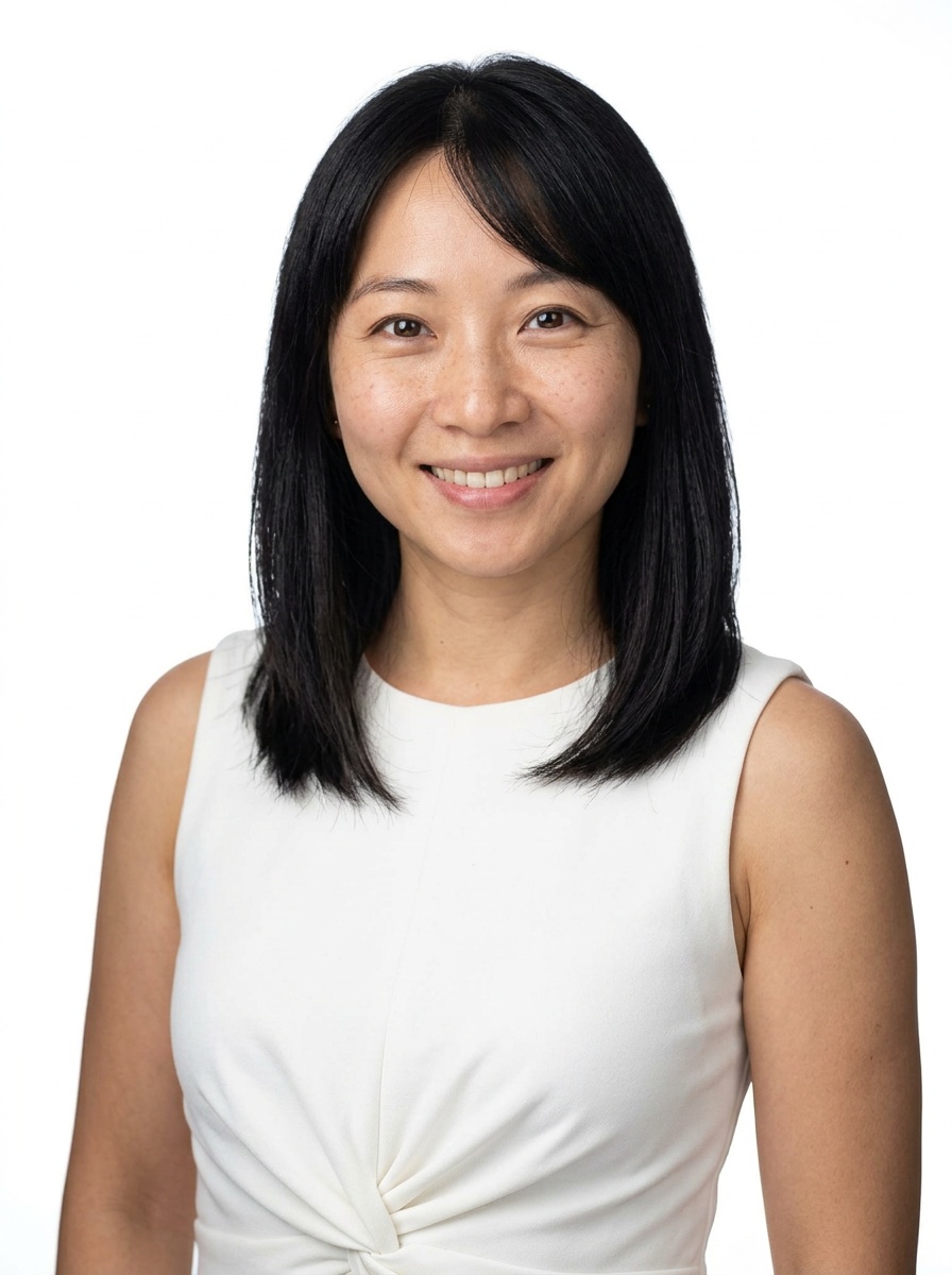 Professional AI LinkedIn headshot in White twist-waist sleeveless dress on White / Pure White Studio