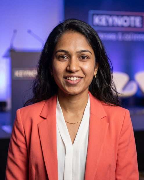 Speaking Stage · Coral Blazer headshot example