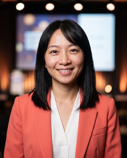 Speaking Stage · Coral Blazer headshot example