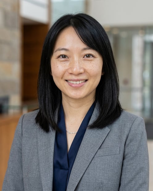 Law Firm Lobby · Soft Gray Suit headshot example