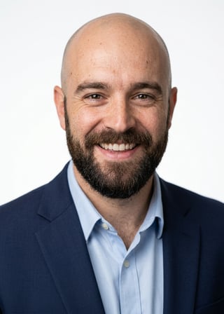 Professional AI LinkedIn headshot in Navy blazer with light blue shirt on White / Pure White Studio