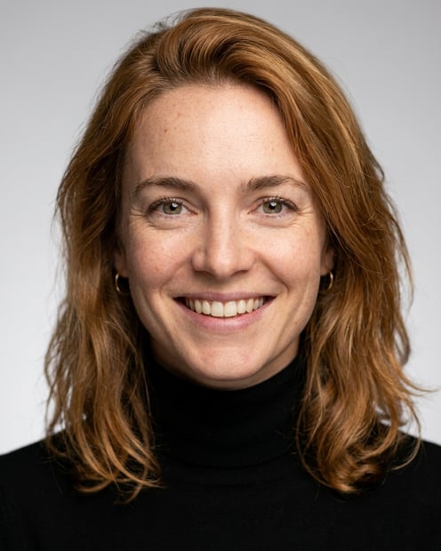 Neutral Gradient / Light Grey · Fitted black turtleneck headshot example