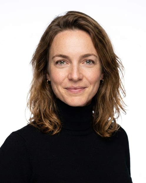 White Studio · Black Turtleneck headshot example