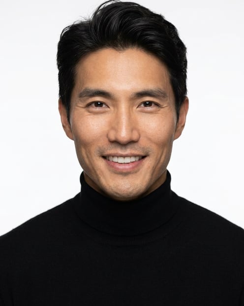 White / Pure White Studio · Fitted black turtleneck headshot example