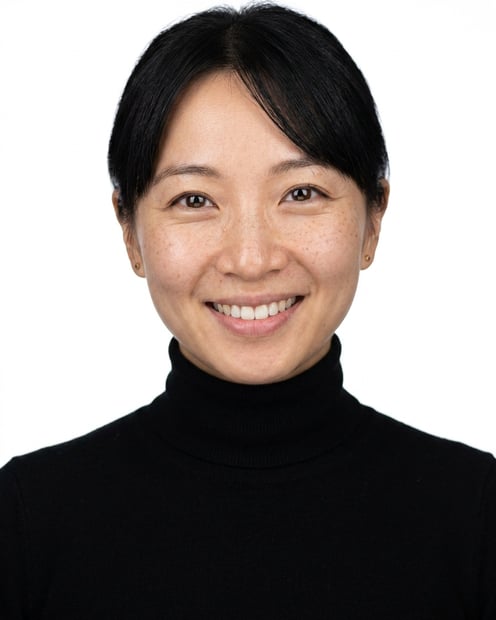 White / Pure White Studio · Fitted black turtleneck headshot example