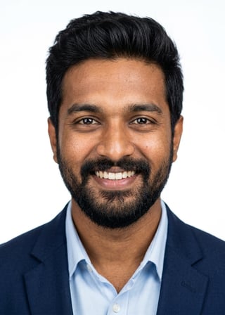 Professional AI LinkedIn headshot in Navy blazer with light blue shirt on White / Pure White Studio