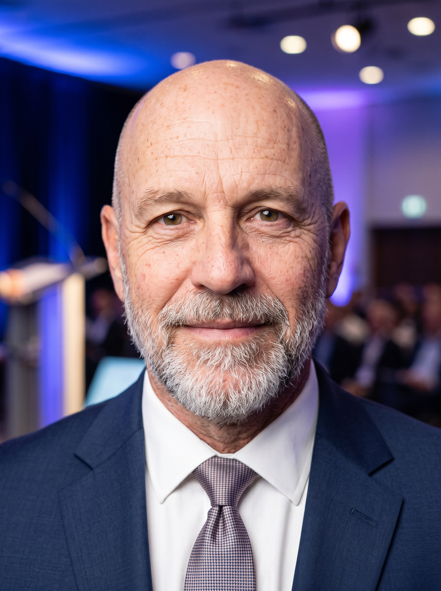 Speaking Stage · Navy Suit headshot example