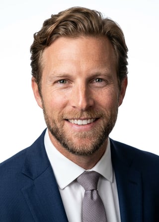 Professional AI LinkedIn headshot in Dark blue tailored suit on White / Pure White Studio