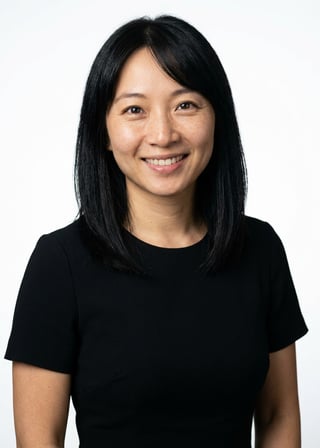 Professional AI LinkedIn headshot in Black midi fitted dress on White / Pure White Studio