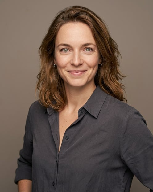 Warm Grey Studio Sweep · Charcoal Button-Up with Dark Pants headshot example