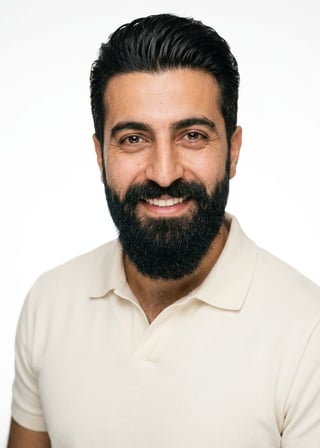 Professional AI LinkedIn headshot in Cream short-sleeve polo on White / Pure White Studio