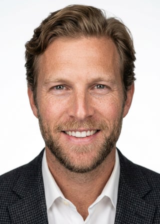 Professional AI LinkedIn headshot in Dark gray patterned blazer on White / Pure White Studio