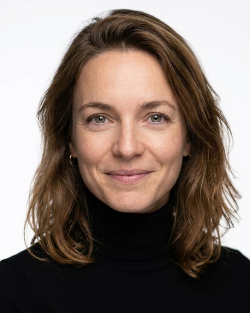White / Pure White Studio · Fitted black turtleneck headshot example