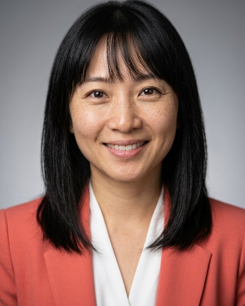 Neutral Gradient / Light Grey · Coral blazer over white blouse headshot example