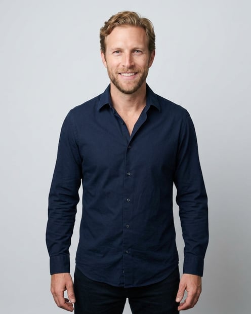 Soft White to Light Grey Studio · Navy Button-Up with Dark Trousers headshot example