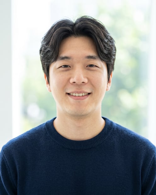Window Light · Navy Knit headshot example