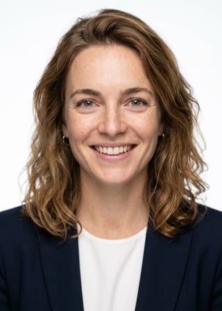 Professional AI LinkedIn headshot in Navy tailored suit on White / Pure White Studio