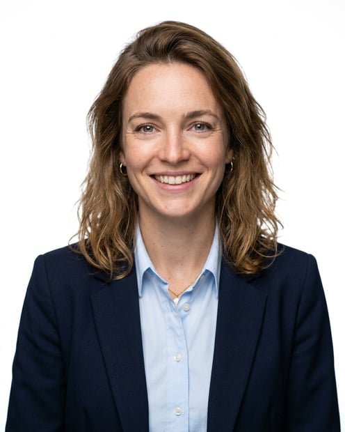 White / Pure White Studio · Navy blazer with light blue shirt headshot example