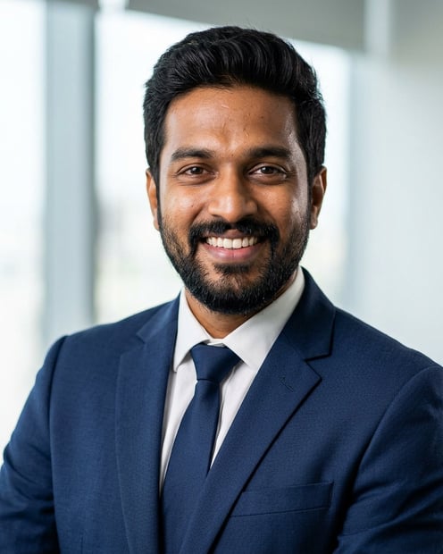 Office / Modern Office Workspace · Dark blue tailored suit headshot example