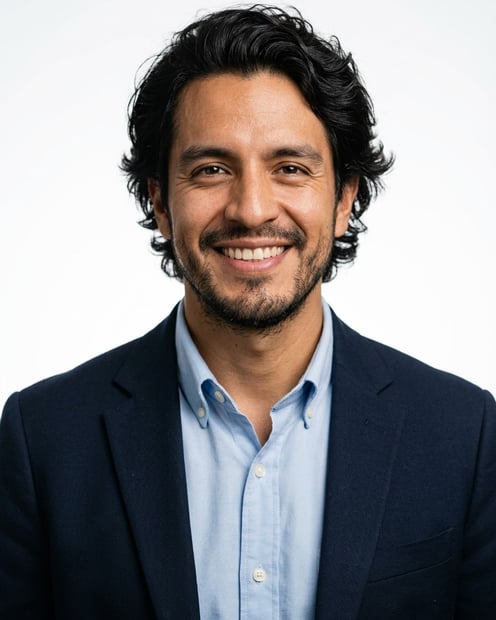 White / Pure White Studio · Navy blazer with light blue shirt headshot example