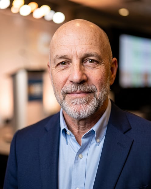 Speaking Stage · Navy Blazer headshot example