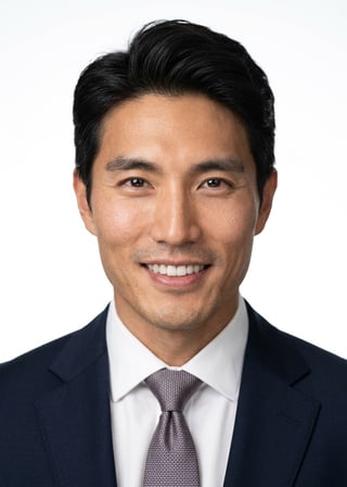 Professional AI LinkedIn headshot in Navy tailored suit on White / Pure White Studio