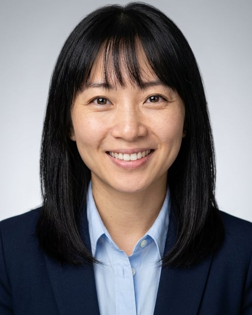 Neutral Gradient / Light Grey · Navy blazer with light blue shirt headshot example