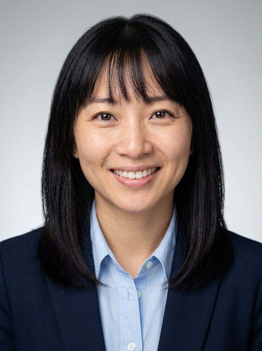 Professional AI LinkedIn headshot in Navy blazer with light blue shirt on Neutral Gradient / Light Grey
