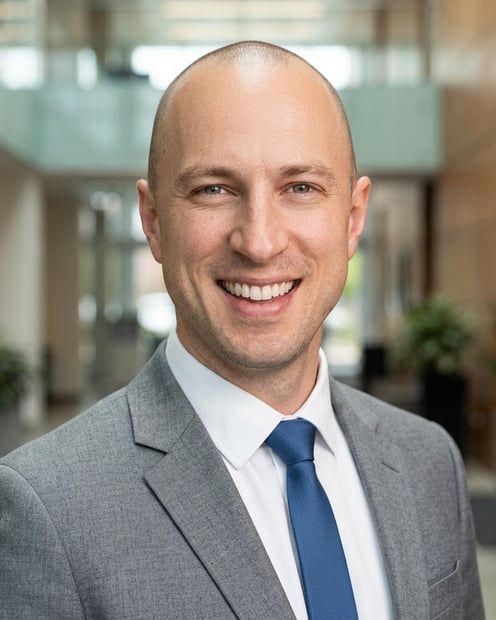 Corporate Lobby · Light Gray Blazer headshot example