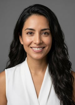Professional AI LinkedIn headshot in Black tailored trousers + white blouse (sleeveless neckline) on Grey Solid