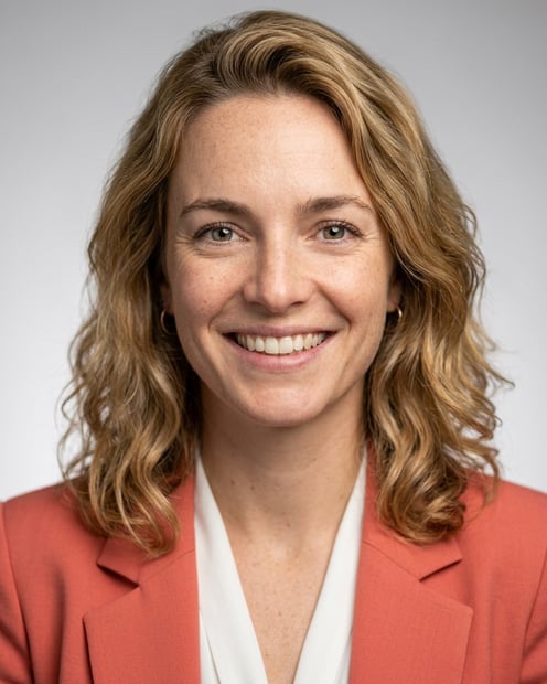 Neutral Gradient / Light Grey · Coral blazer over white blouse headshot example