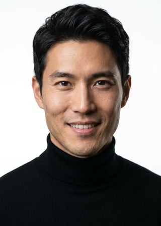 Professional AI LinkedIn headshot in Fitted black turtleneck on White / Pure White Studio