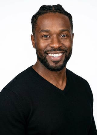 Professional AI LinkedIn headshot in Black v-neck sweater on White / Pure White Studio