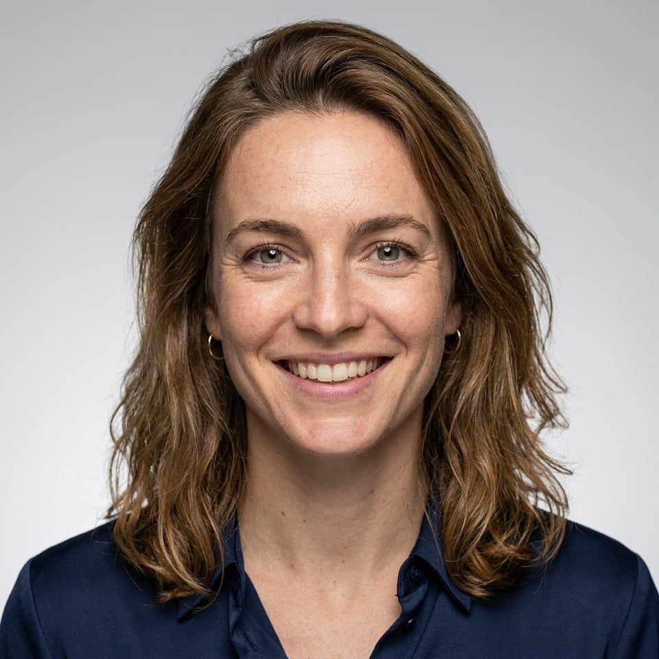 Professional AI LinkedIn headshot in Silk blouse trousers on Neutral Gradient / Light Grey