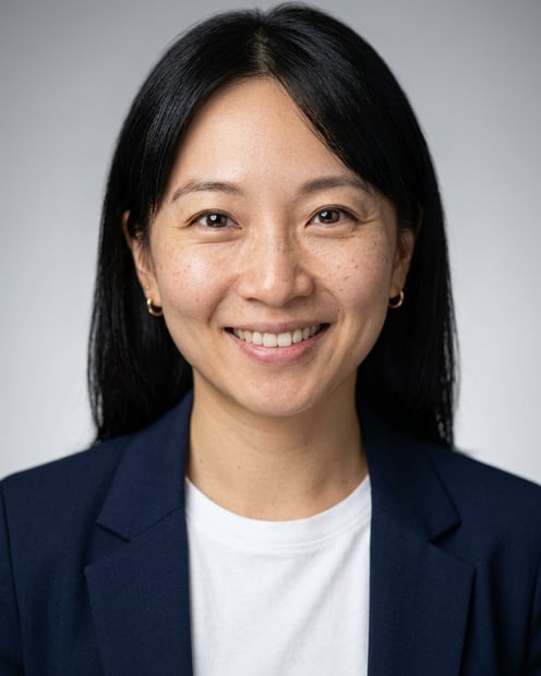 Neutral Gradient / Light Grey · Open navy blazer over simple white tee headshot example