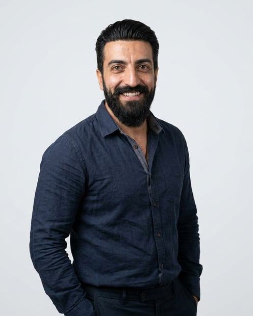 Soft White to Light Grey Studio · Navy Button-Up with Dark Trousers headshot example