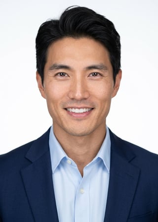 Professional AI LinkedIn headshot in Navy blazer with light blue shirt on White / Pure White Studio