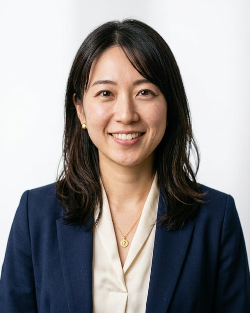Clean White Studio · Open-Collar Blazer headshot example