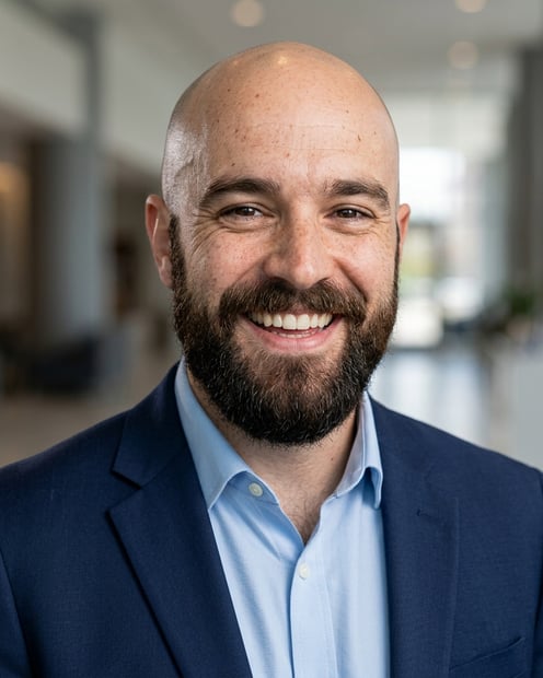 Lobby · Navy blazer with light blue shirt headshot example