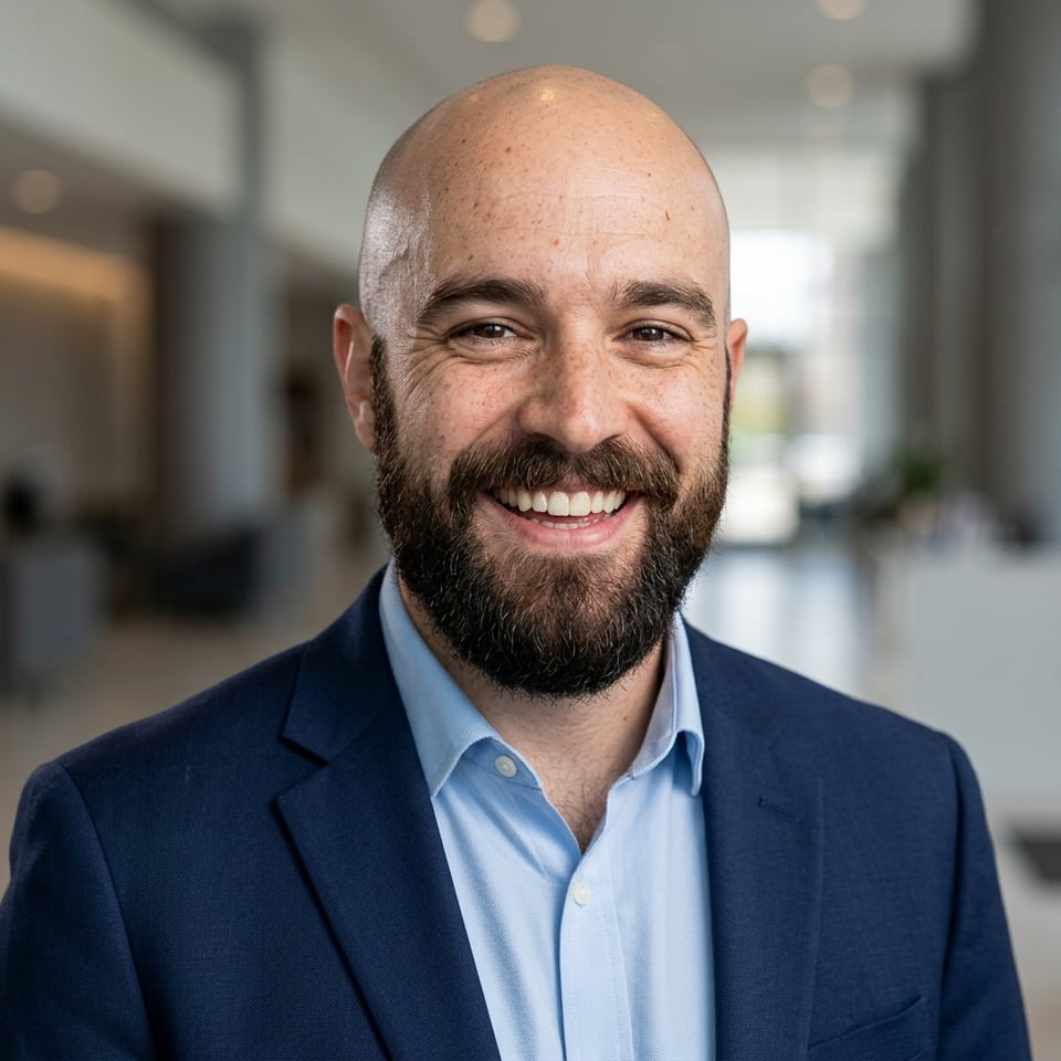 Professional AI LinkedIn headshot in Navy blazer with light blue shirt on Lobby (corporate lobby)