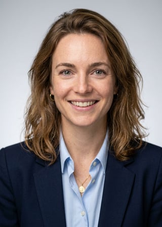 Professional AI LinkedIn headshot in Navy blazer with light blue shirt on Neutral Gradient / Light Grey