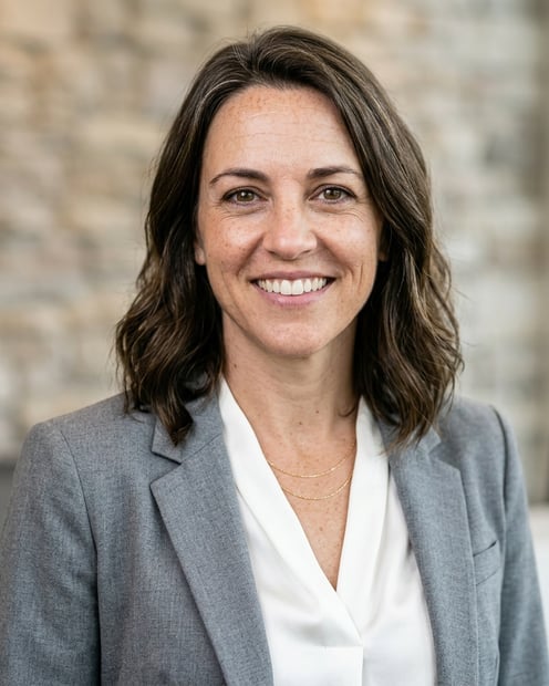 Bright Reception Wall · Soft Gray Suit headshot example