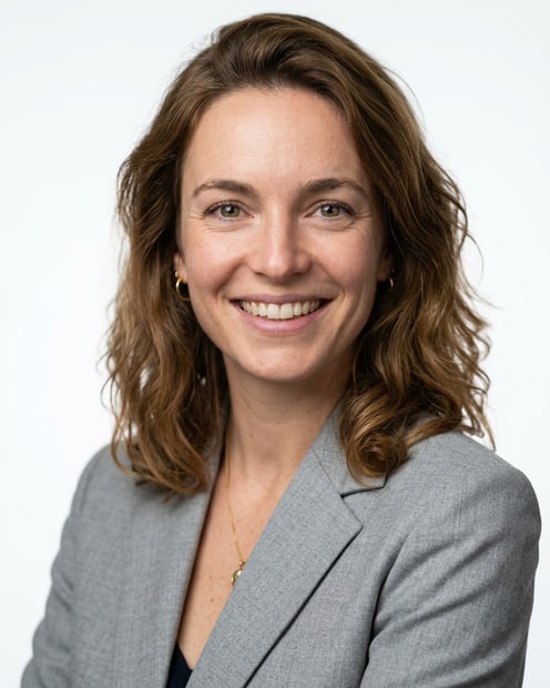 White / Pure White Studio · Light gray blazer headshot example