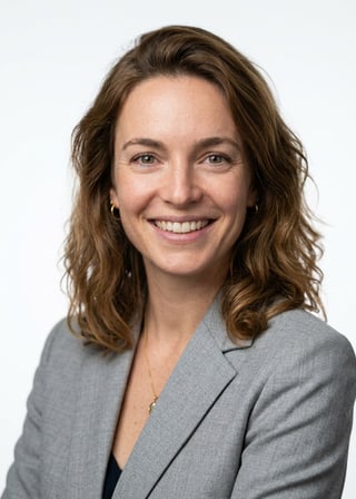 Professional AI LinkedIn headshot in Light gray blazer on White / Pure White Studio