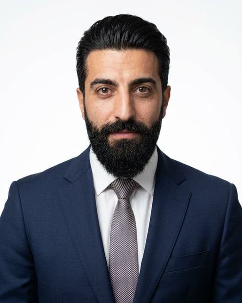 White / Pure White Studio · Dark blue tailored suit headshot example