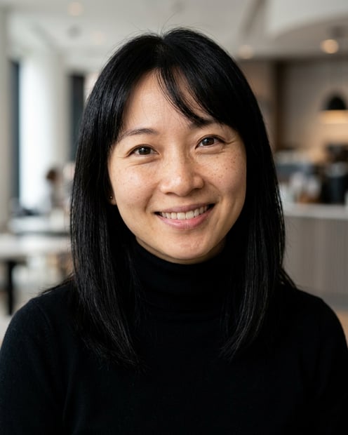 Cafe · Fitted black turtleneck headshot example