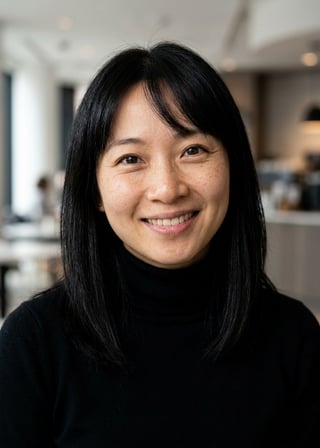 Professional AI LinkedIn headshot in Fitted black turtleneck on Cafe (warm professional)