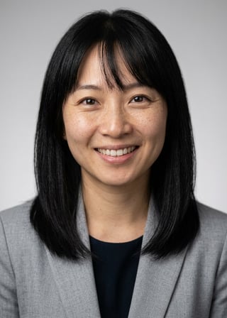 Professional AI LinkedIn headshot in Light gray blazer on Neutral Gradient / Light Grey